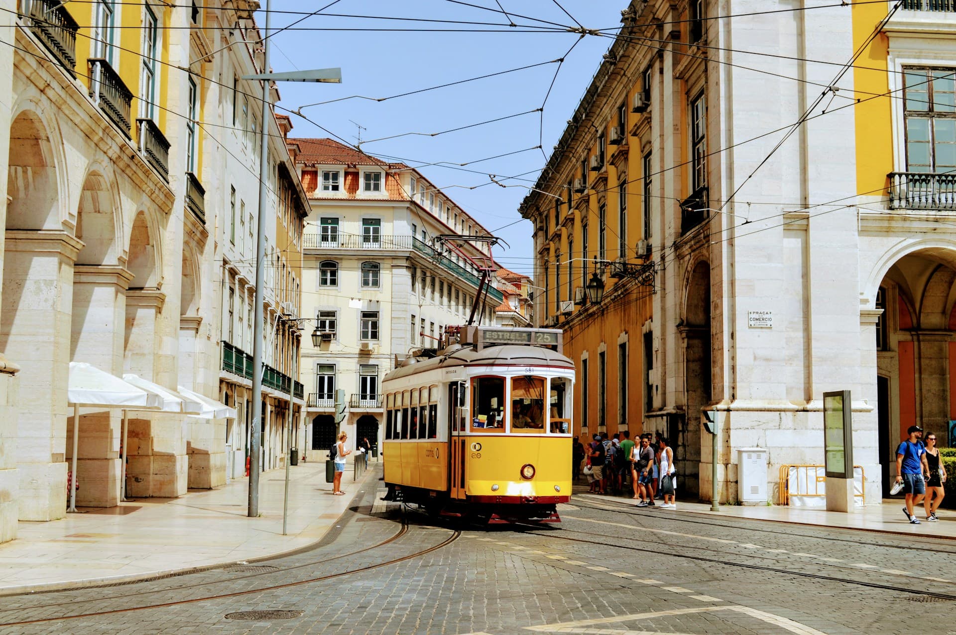 Lisbon yellow tram on street